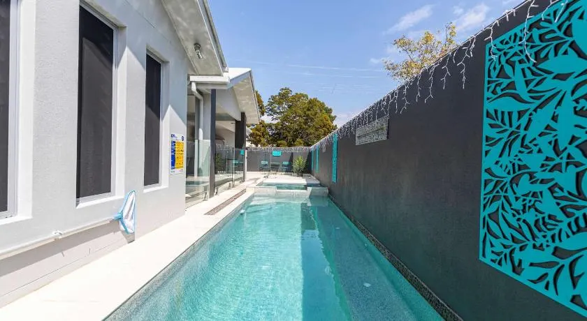 Bribie Breeze Family Retreat with Pool & BBQ - Image 1