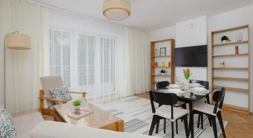 Comfortable Apartment with a Terrace and 3 Bedrooms by Noclegi Renters - Image 1