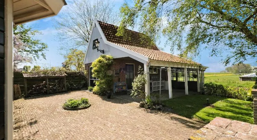 Idyllisch en knus huisje met prachtige veranda. - Image 1