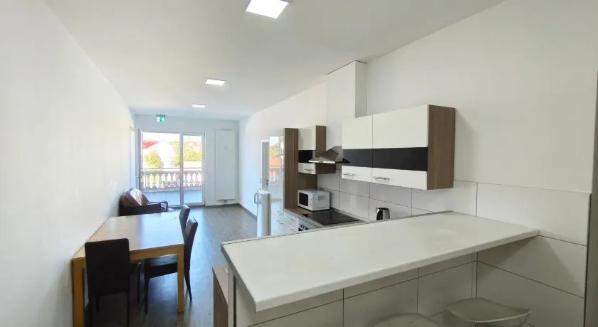Spacious Worker Apartments with Rooftop Terrace - Up to 21 Guests - Image 1
