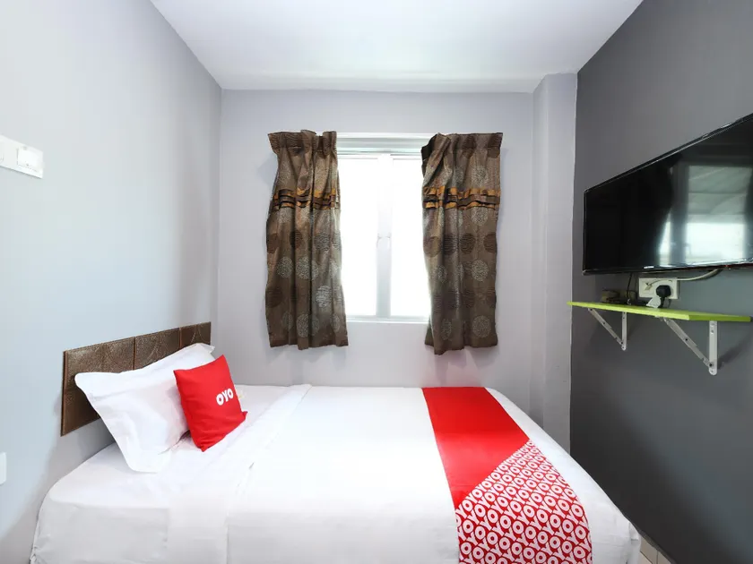 Hotel O 1184 Ho Hotel - Image 1
