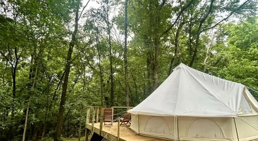 Enchanting Mountain Glamping Tents with Elevated Decks and Fire Pit Near Gentry, AR - Image 1