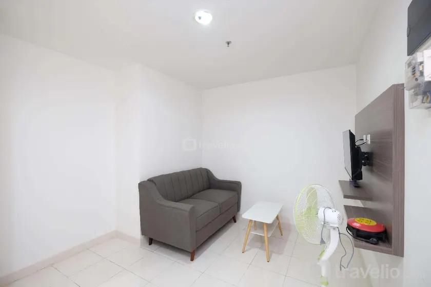 Comfort and Homey 2BR at Sentul Tower By Travelio - Image 1