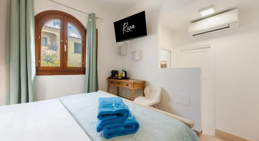 Riva rooms - by Obiettivo vacanza Budoni - Image 1