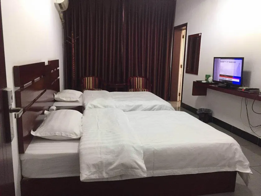 Shangli Xindihao Business Hotel - Image 1