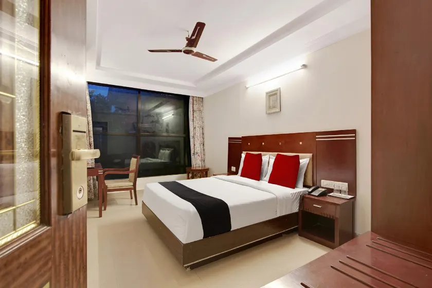 Capital O Elegant Amethyst Business Hotel Near Ragigudda Sri Prasanna Anjaneyaswamy Temple - Image 1