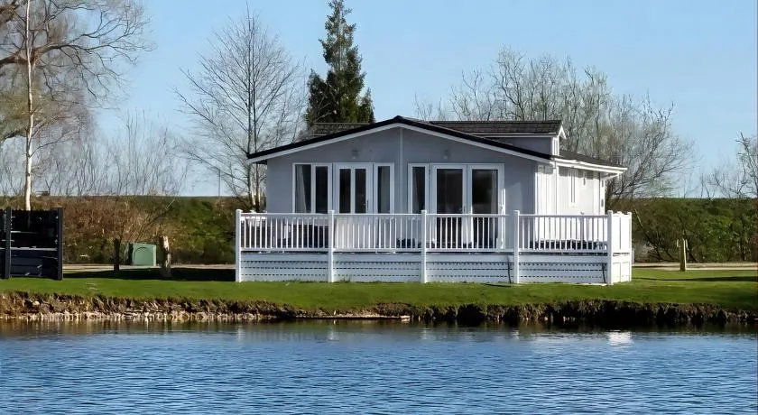Indulgence Fishing Lodge with Private Hot Tub - Image 1
