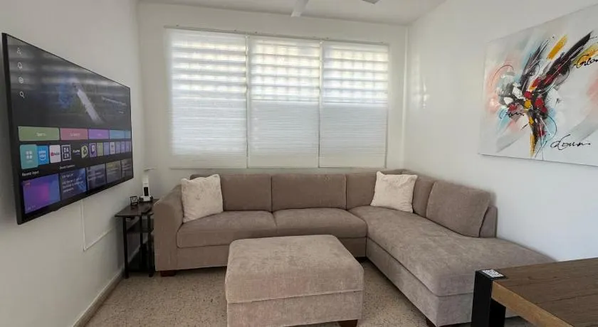 StayDelRom Cozy 3BR Home 8 Min to Airport 5 to Mall of San Juan 2 to Restaurants - Image 1