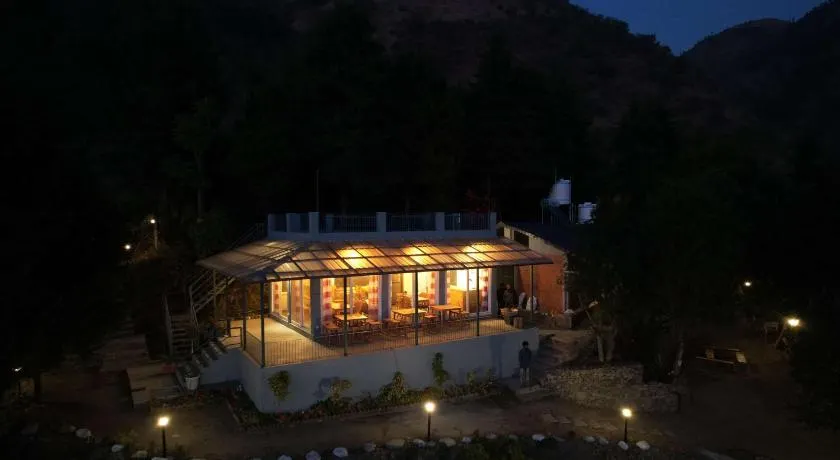amã Stays & Trails Godhuli Cottages Naukuchiatal - Image 1