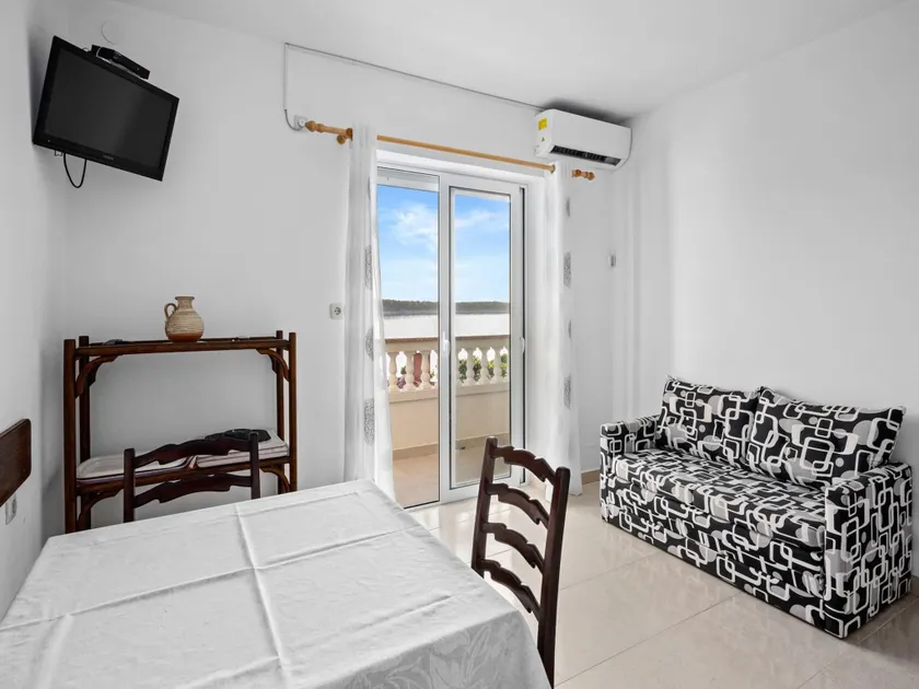Coastal Comfort with Balcony - Image 1