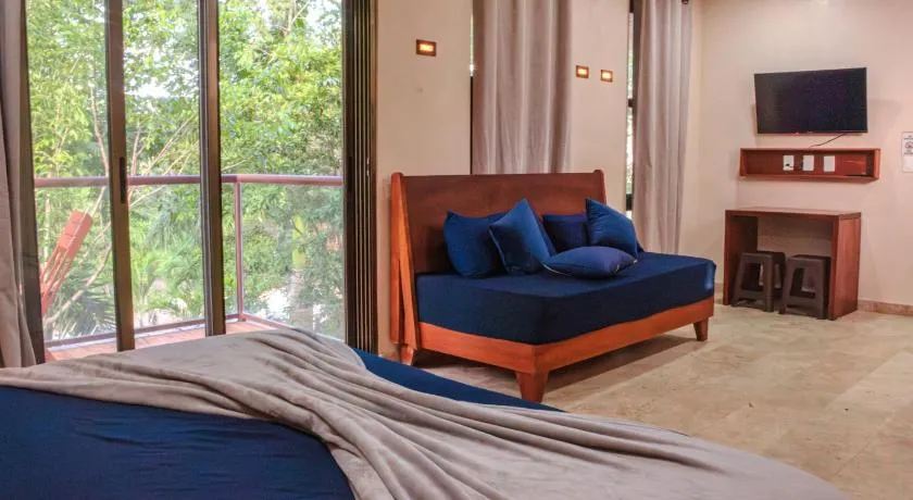 Jungle Loft Suite with Terrace & Natural Light - Santuario Hotel Boutique - Image 1