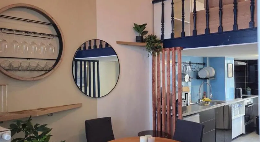 Industrial-Style Loft with Mezzanine Bedroom in Prime Area - Image 1
