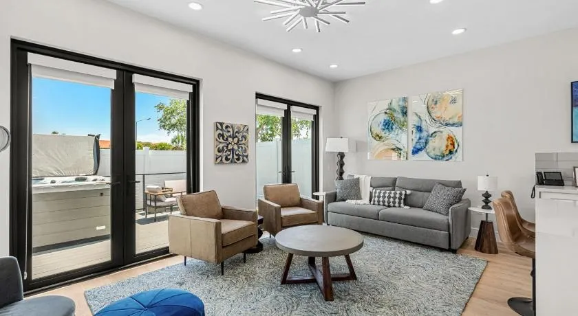Salty Serenity Villa - New Luxe Escape with Hot Tub Spa & Rocket Views - Walk to Beach - Image 1
