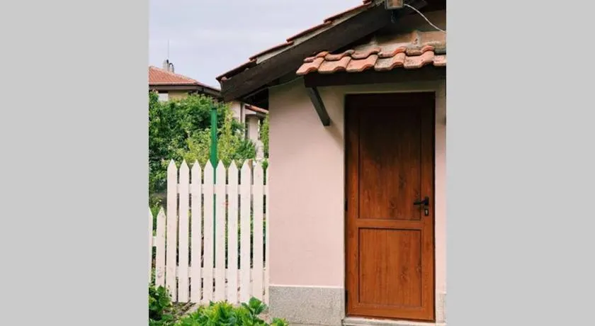 Cute Little House with a White Picket Fence - Image 1