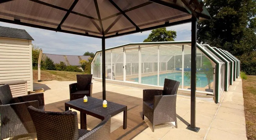 Stone cottage with private covered pool near the medieval city of Josselin. - Image 1
