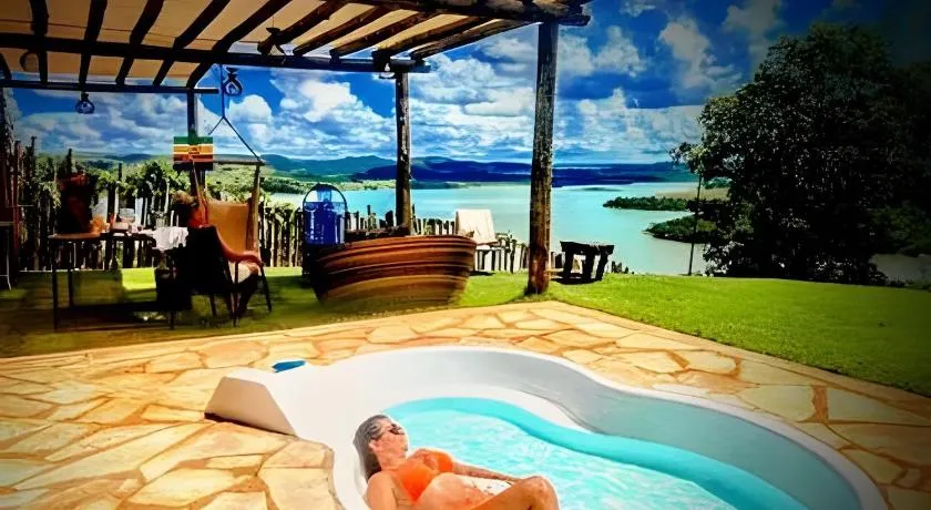 Chalé Mirante, piscina, cachoeira, lago e vista espetacular em Alexânia Goiás - Image 1