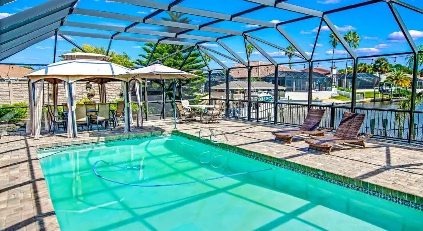 Saltwater Canal Home with Heated Pool - Image 1