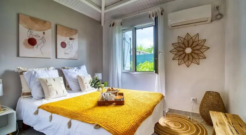 Appartement Domi Caraïbes confortable avec une piscine chauffée et sécurisée par un filet, une citerne tampon pour faire face aux coupures d'eau, accès Netflix - Image 1