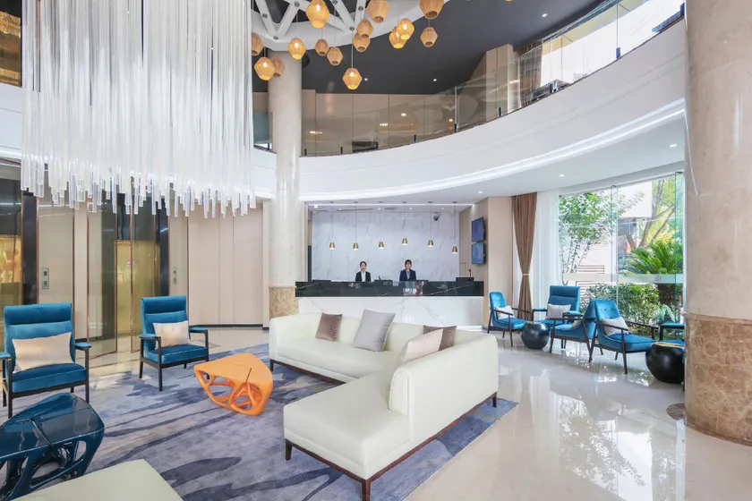 Huanlesong Hotel - Image 1