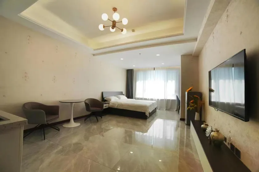 Harbin Jiuchen Apartment Hotel - Image 1