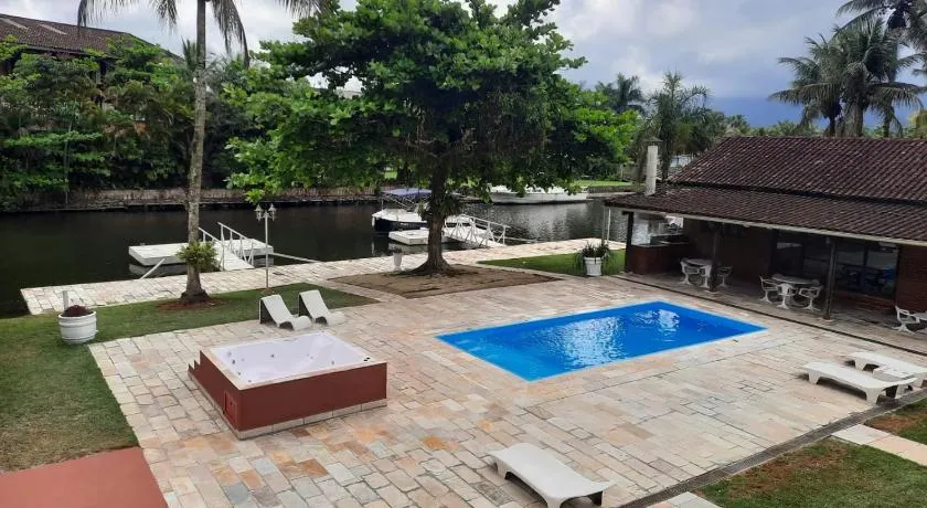 Casa na Marina com piscina churrasqueira e píer - Image 1