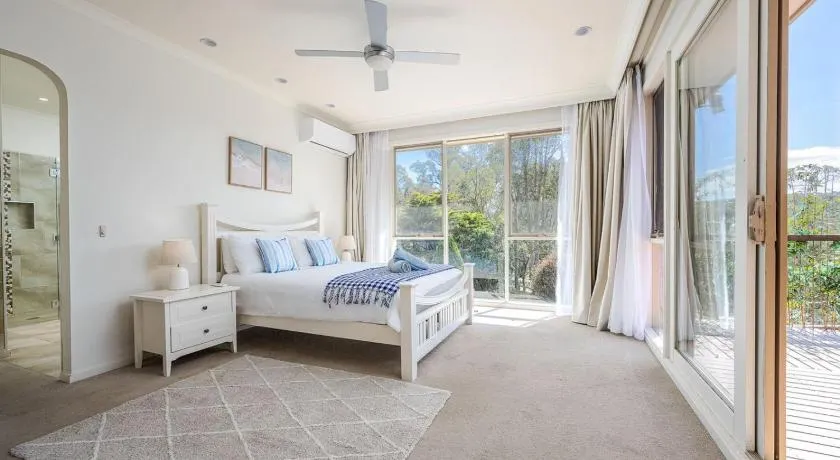 Peaceful Bushland Retreat with Treetop Hills Views - Image 1