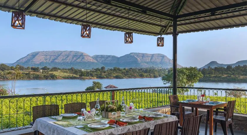 SaffronStays Lake House Bouganvillea, Nashik - rustic pool villa with great lake views and patio dining - Image 1