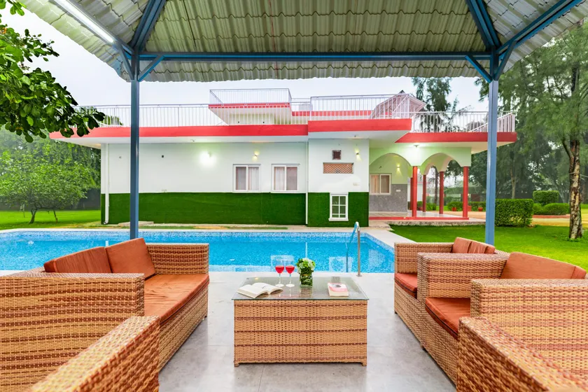 Alaya Stays Luxe FarmAcre Pet-friendly 4-BHK Villa With Private Pool, Garden & Terrace - Image 1