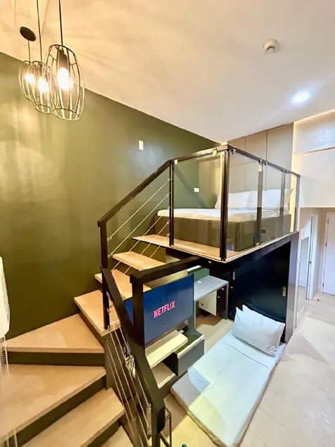 Cozy king bed with sofa bed Sunvida Tower Across SM Cebu with Balcony - Image 1