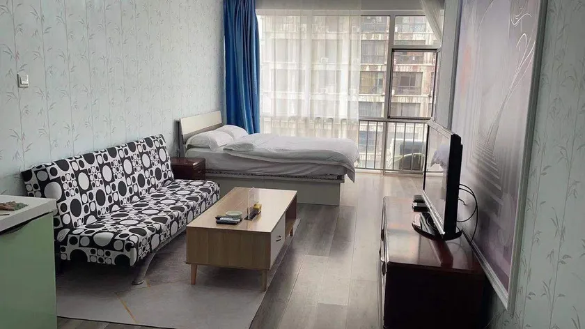 Aocheng Apartment Hotel - Image 1