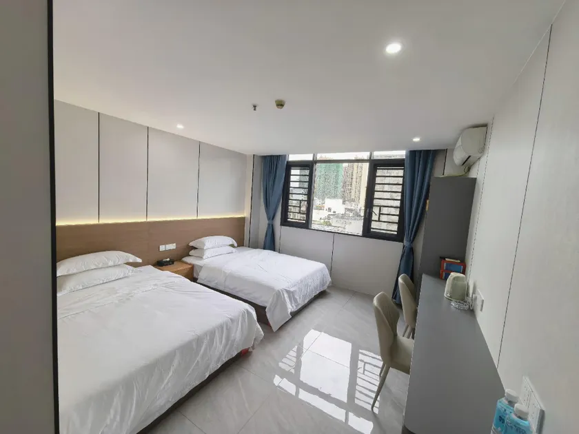 Yunan Jiuxingdao Business Hotel - Image 1