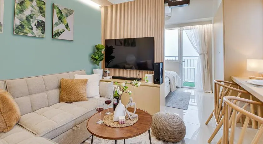 SMDC Wind - Panoramic View of Taal Lake and Greenery - Casa Nova Staycations - Image 1