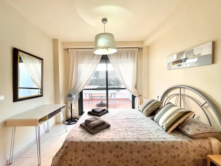 Apartment near beach with pools and hot tub - Image 1