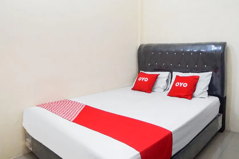 OYO 90785 Mutiara Guest House - Image 1