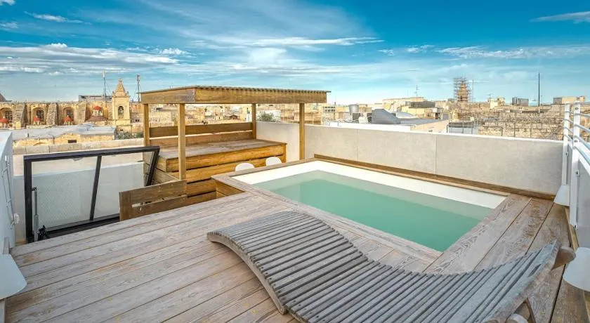 Modern Oasis Near Mdina with Rooftop Pool & View - Image 1
