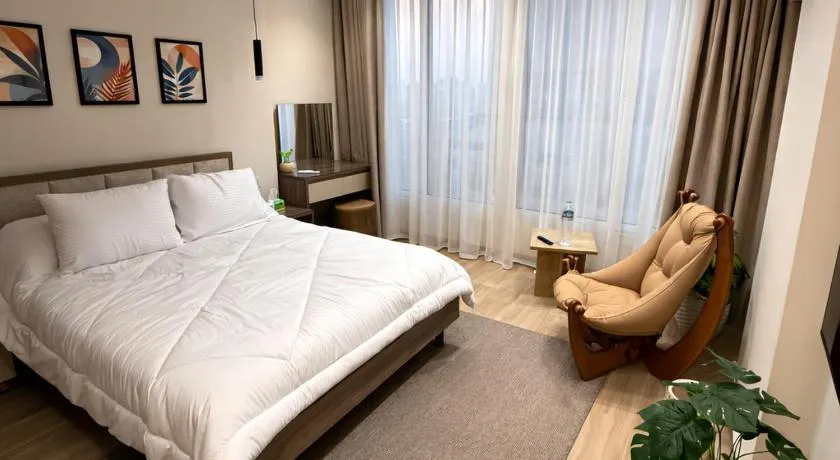 Zamalek 2BR Modern Stay - Partial Nile View - Image 1