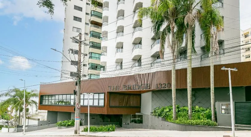 The Bridge by Viva - Prédio com piscina no terraço e academia em Floripa - Image 1