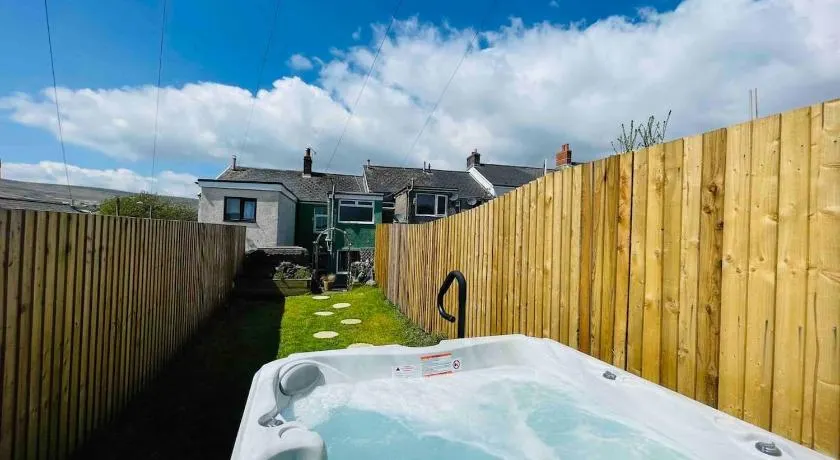 HOT TUB - Miners Cottage - edge of Brecon Beacons National Park - Heritage Town - Image 1