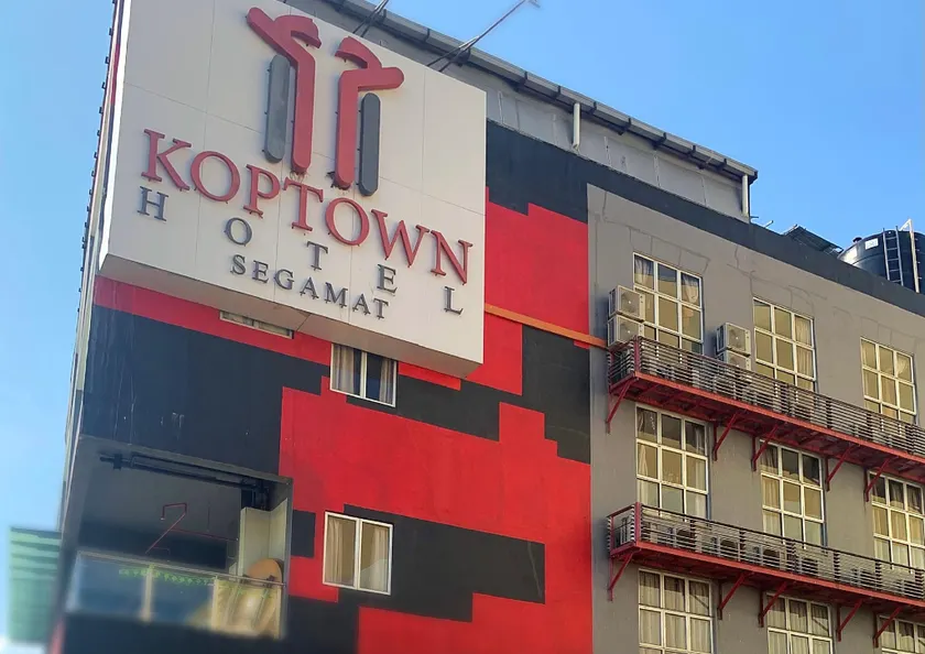 Syajie Koptown Hotel - Image 1