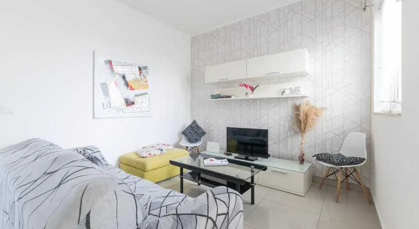 Spacious Apartment with Side Sea View - Image 1