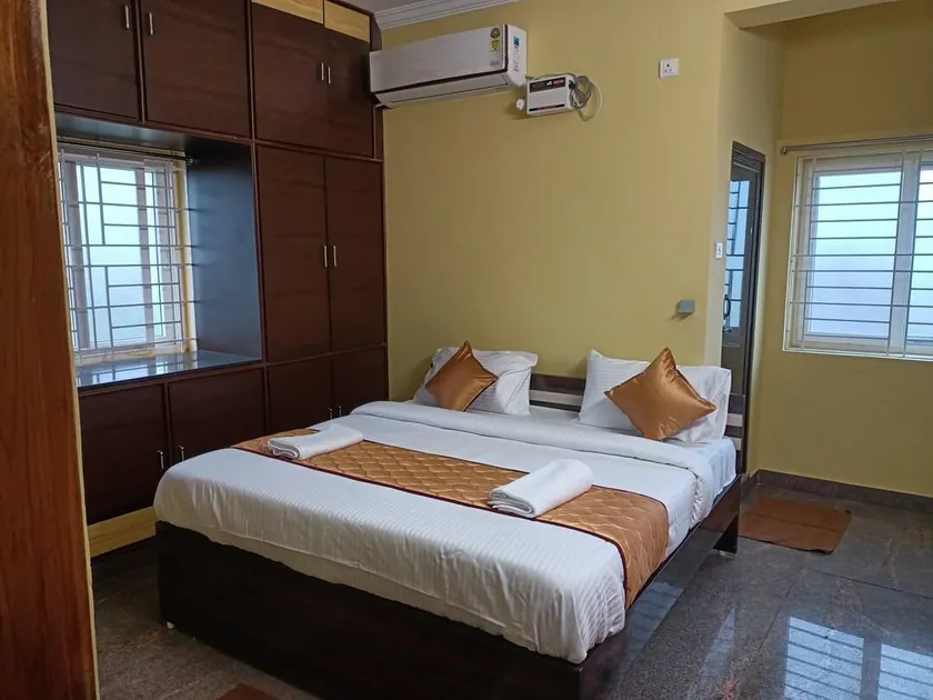 Four Seasons Homestay - Best Homestay in Tirupati- Luxurious Two Bedrooms Luxury AC apartments - Fast WiFi, Kitchen, Android TV - Easy access to Airport, Railway Station and to all Temples - Image 1