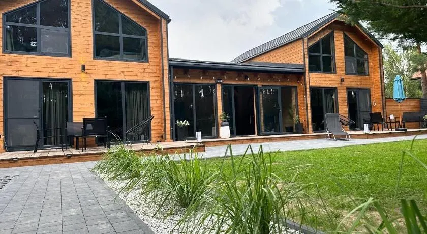 DOMKI Leśna Cisza jezioro Powidzkie dla 18 osób z Jacuzzi Gratis - 5D Apartments - Image 1