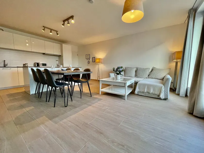 Modern 2BR 1.5 BA Near Diamond District by Oneluxstay - Image 1