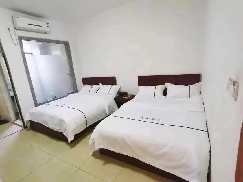 Dongguan Kangxin Huafu Business Apartment - Image 1