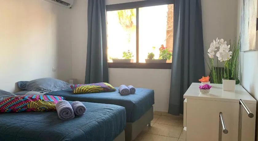 Bedroom with shared bathroom and swimming pool - Image 1