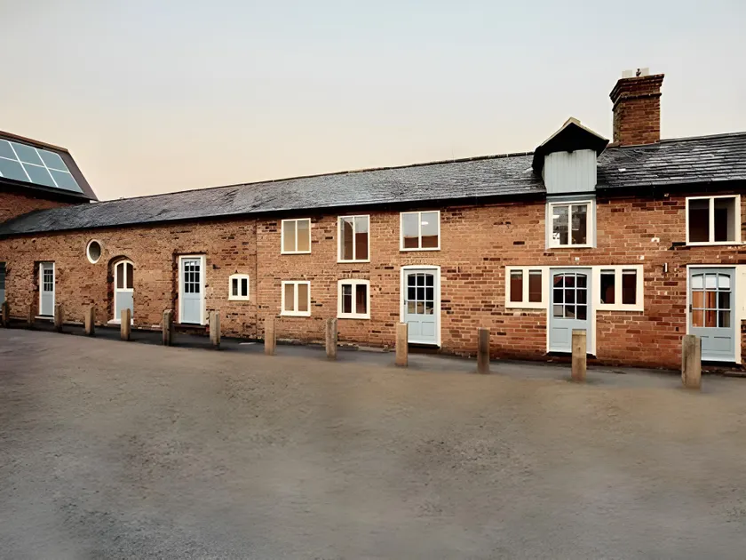 THE COACHING BARNS - Image 1