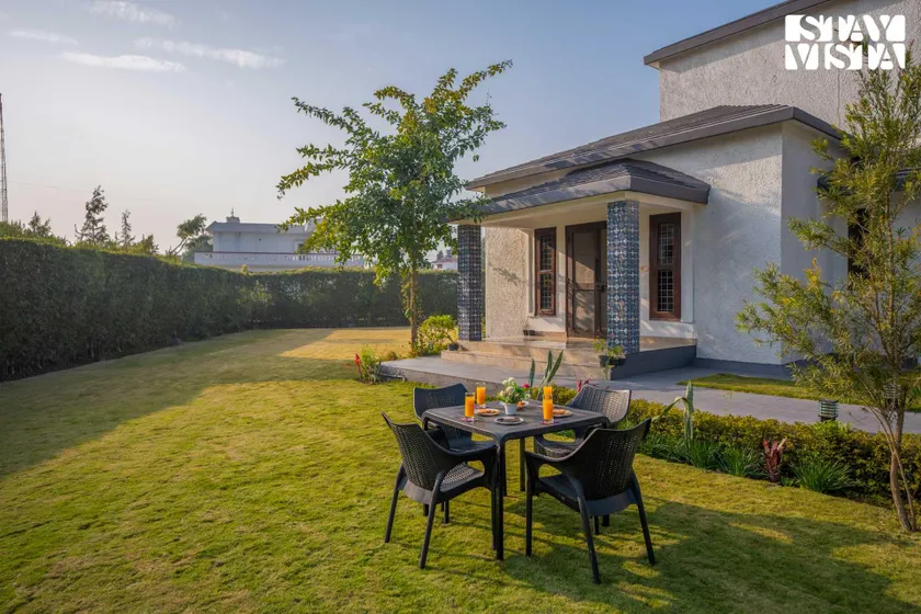 StayVista at Olive fields with Shared pool, BBQ - Image 1