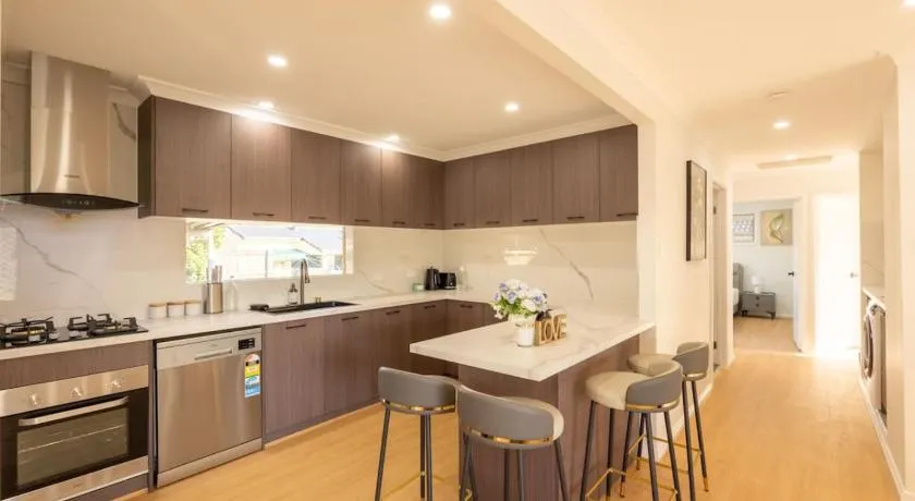 Super Value 4BR House near Westfield Shops and Parks - Image 1