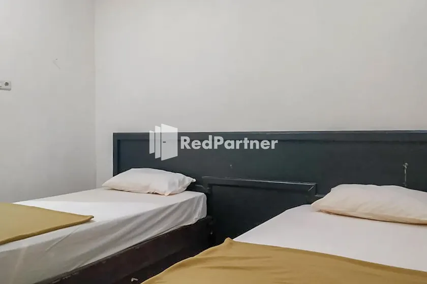 Palu City Guest House Mitra RedDoorz - Image 1