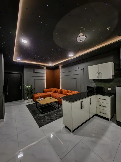 Dark Cozy 1BHK Sleep under the Stars Indoors with Swimming pool Gym and Cinema - Image 1